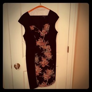 Black dress with floral-print panel on front